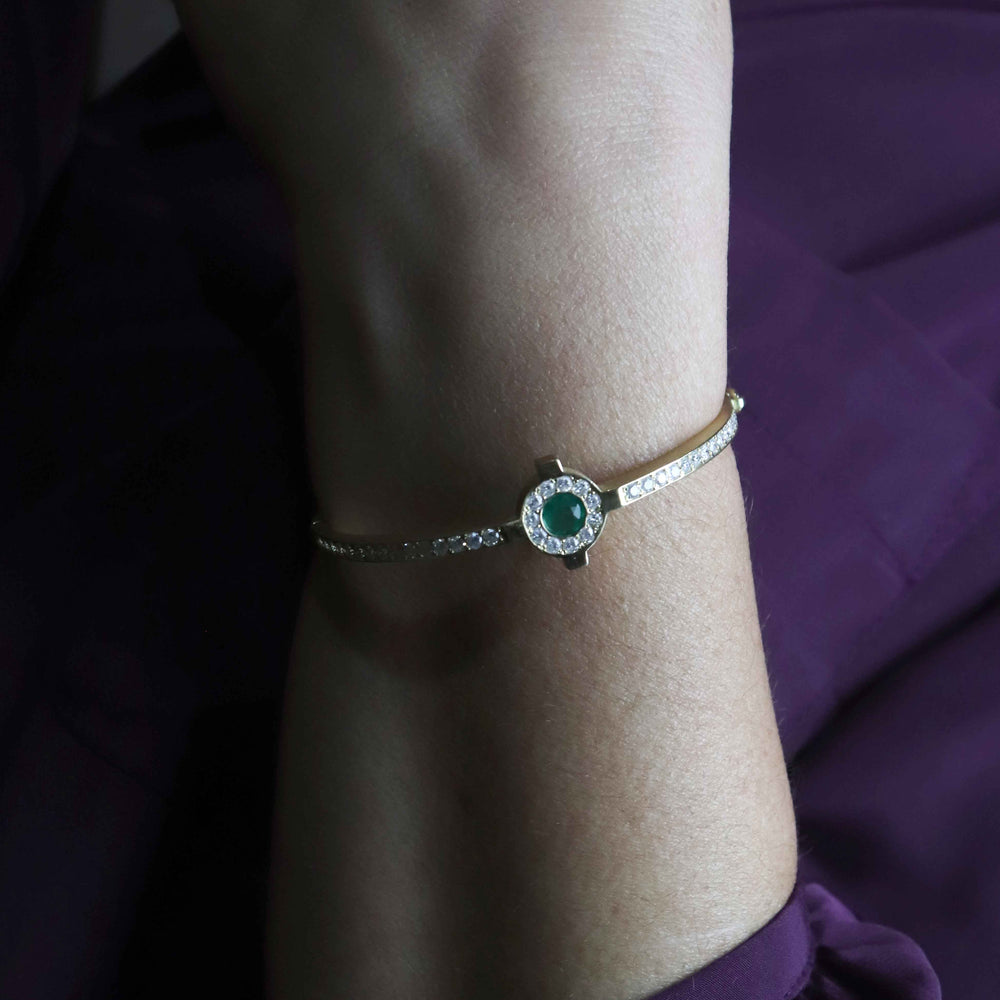 
                      
                        Bracelete Origem em ouro amarelo, diamantes e esmeralda
                      
                    