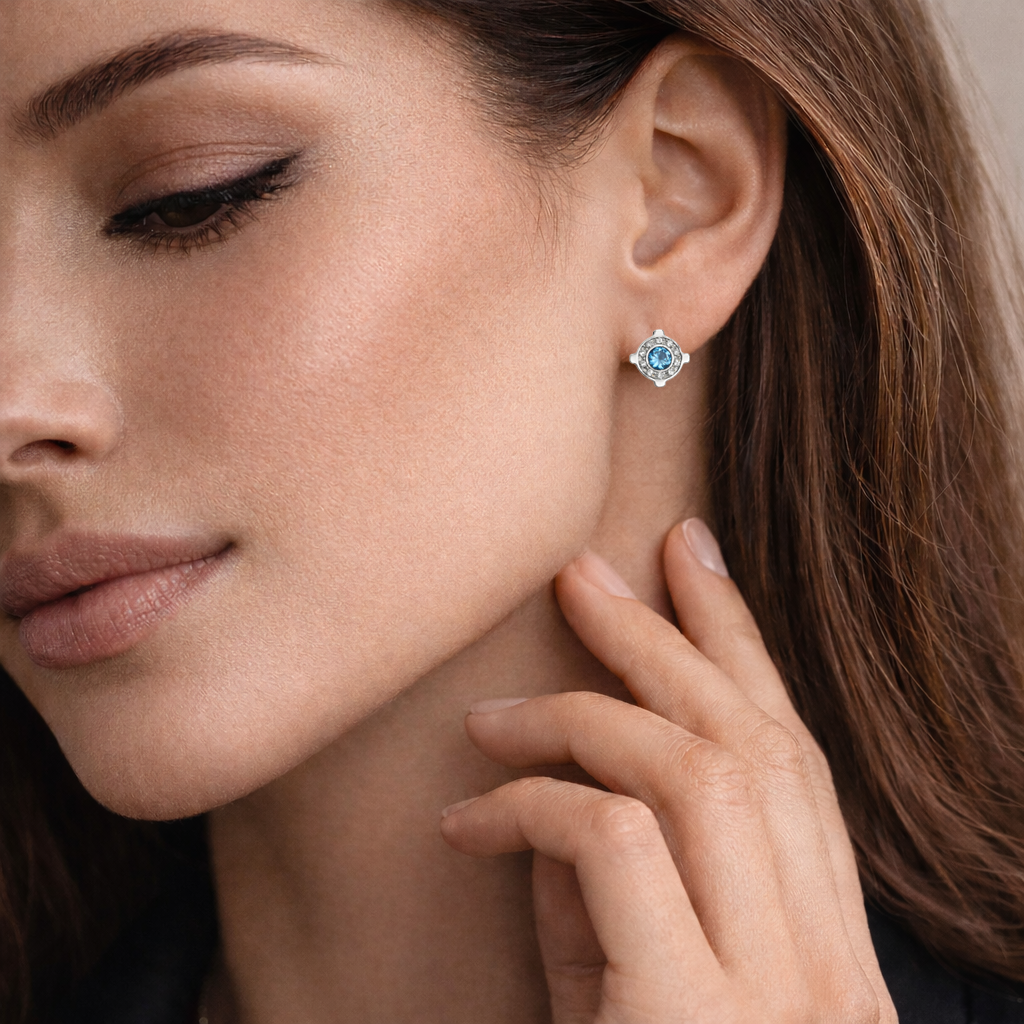 brincos em ouro branco 18k com topázio e brilhantes visual elegante
