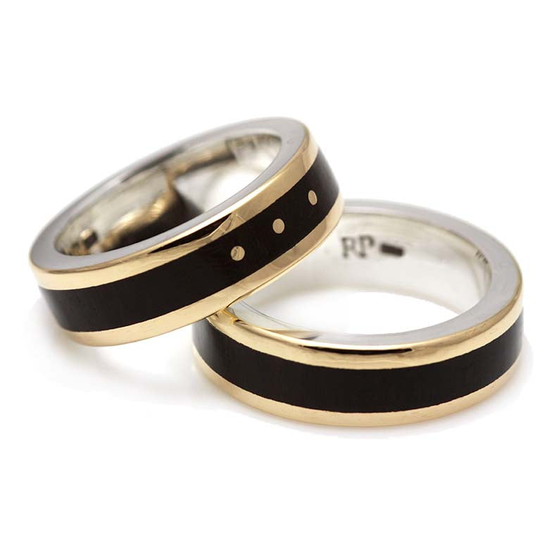 aliancas em prata 950 com jacaranda e detalhes em ouro 18k acabamento polido
